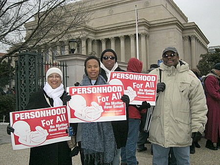 African-Americans at the March for Life, Washington, D.C., with signs that say, 'Personhood for All'