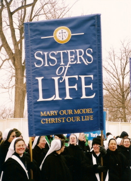 Sisters of Life with their blue banner