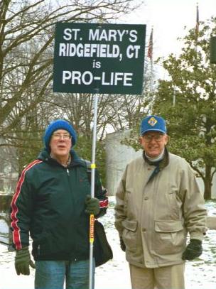 Two men with sign: 'St. Mary's/Ridgefield, CT/is Pro-Life'