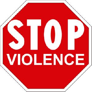Large, white-on-red stop sign that says, 'STOP VIOLENCE'