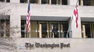 Flags fly at the <em>Washington Post</em> building, Washington, D.C.