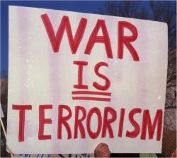 Sign that says: 'War <u>Is</u> Terrorism'